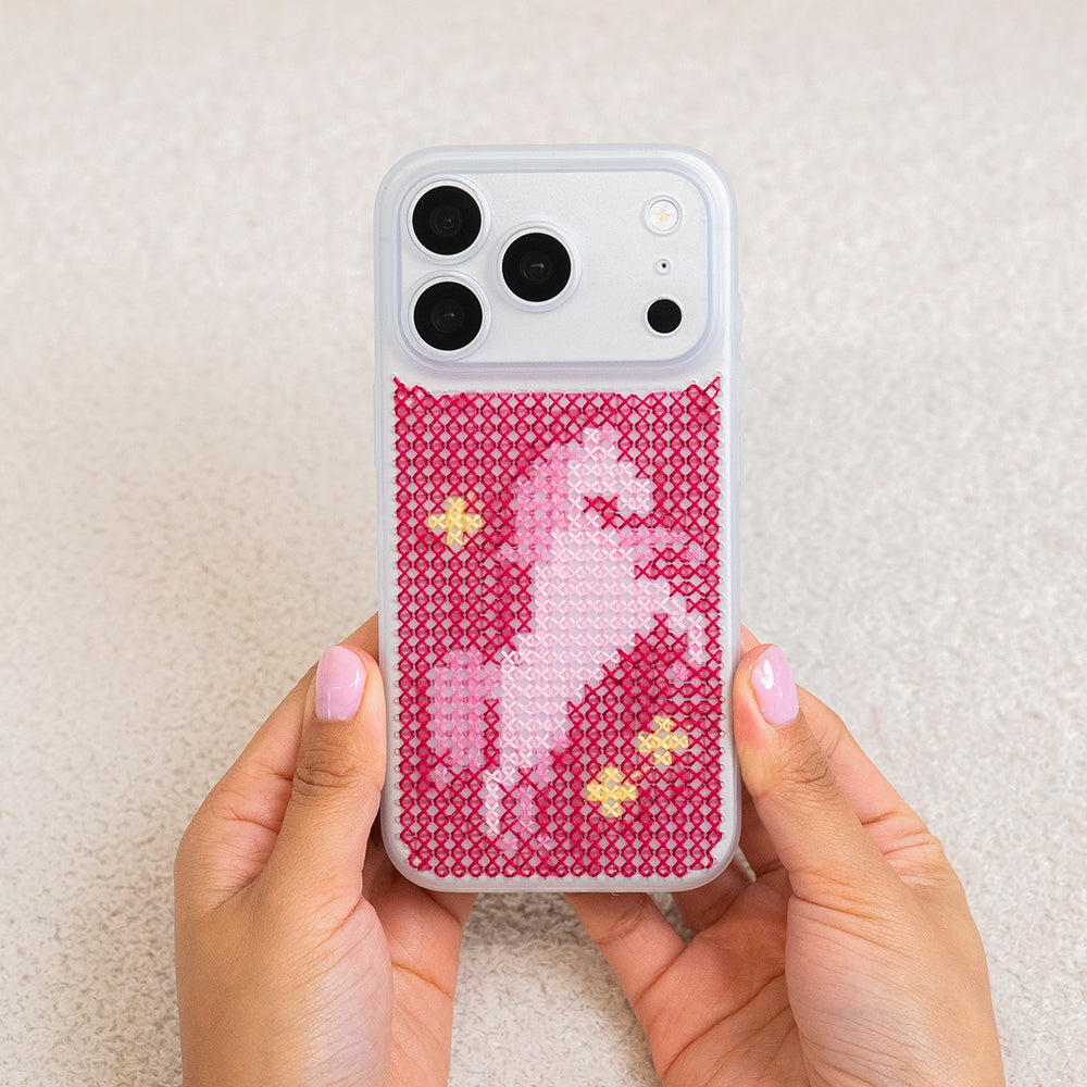 Craft Club Pink Pony Craft Club Cross Stitch Phone Case Kit — finished case held in hands