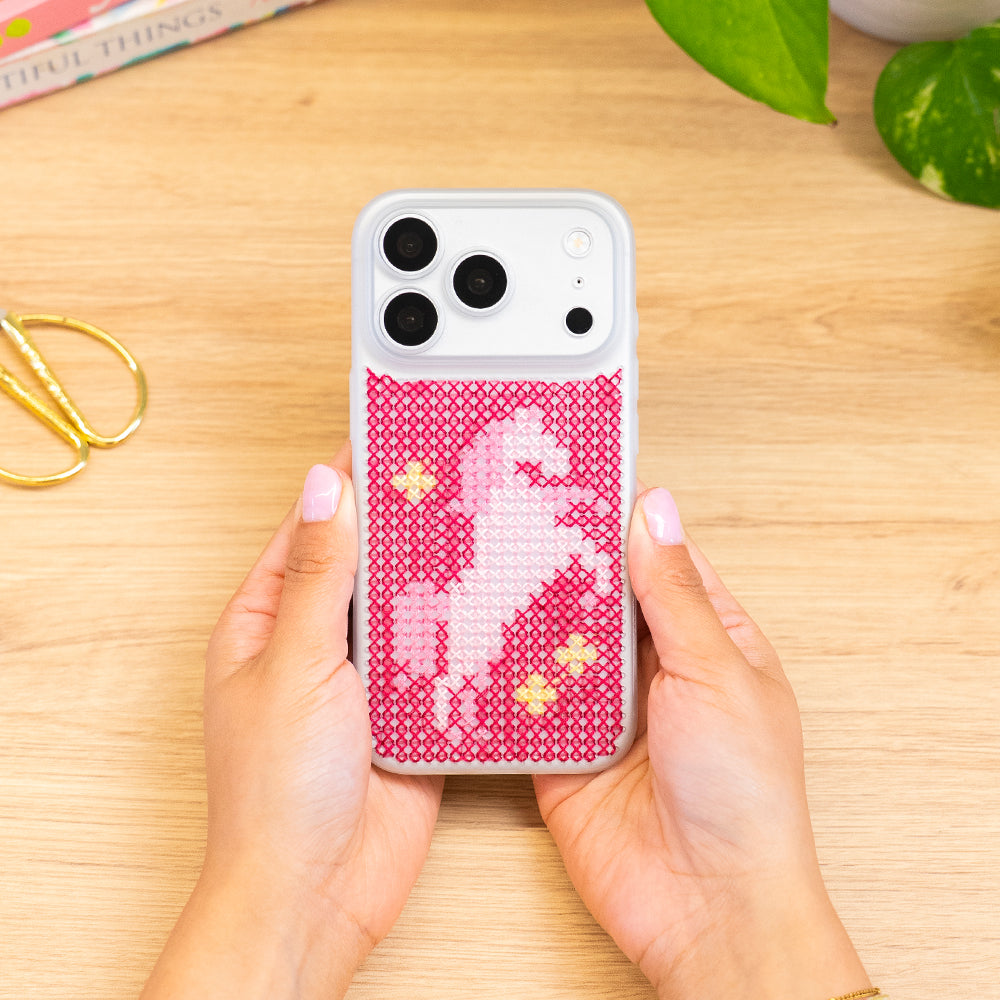 Craft Club Pink Pony Craft Club Cross Stitch Phone Case Kit — finished case held in hands