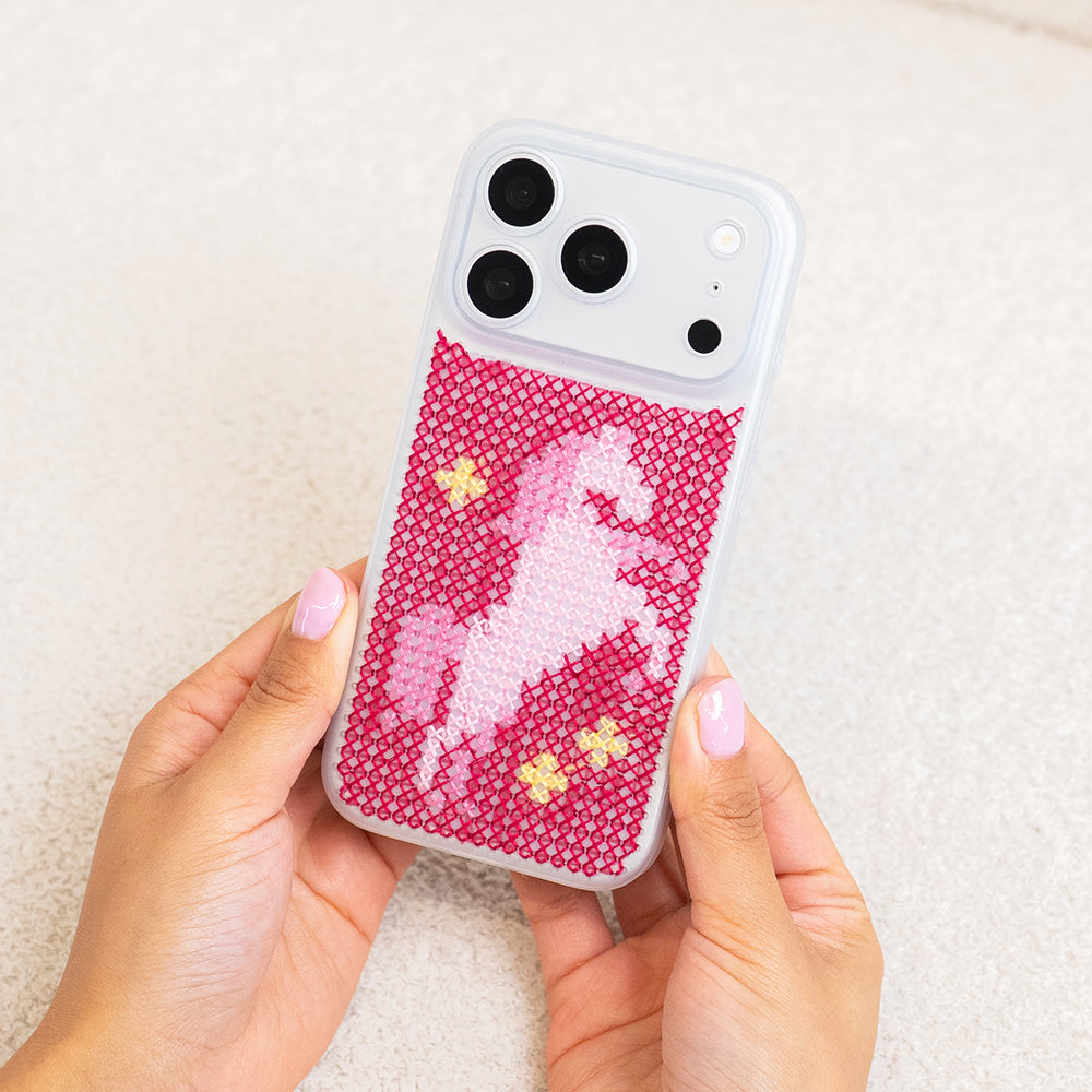 Craft Club Pink Pony Craft Club Cross Stitch Phone Case Kit — finished case held in hands