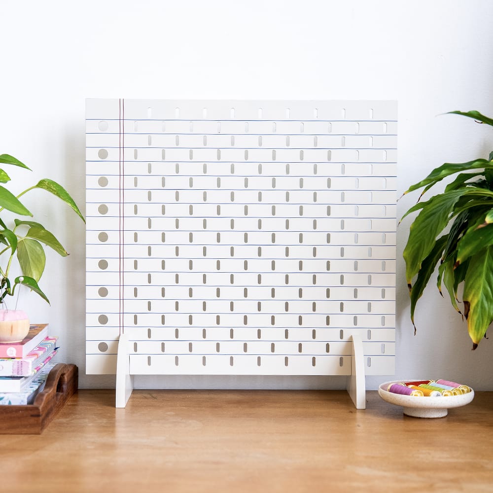 Craft Club TAKING NOTES - Pegboard — on a sideboard
