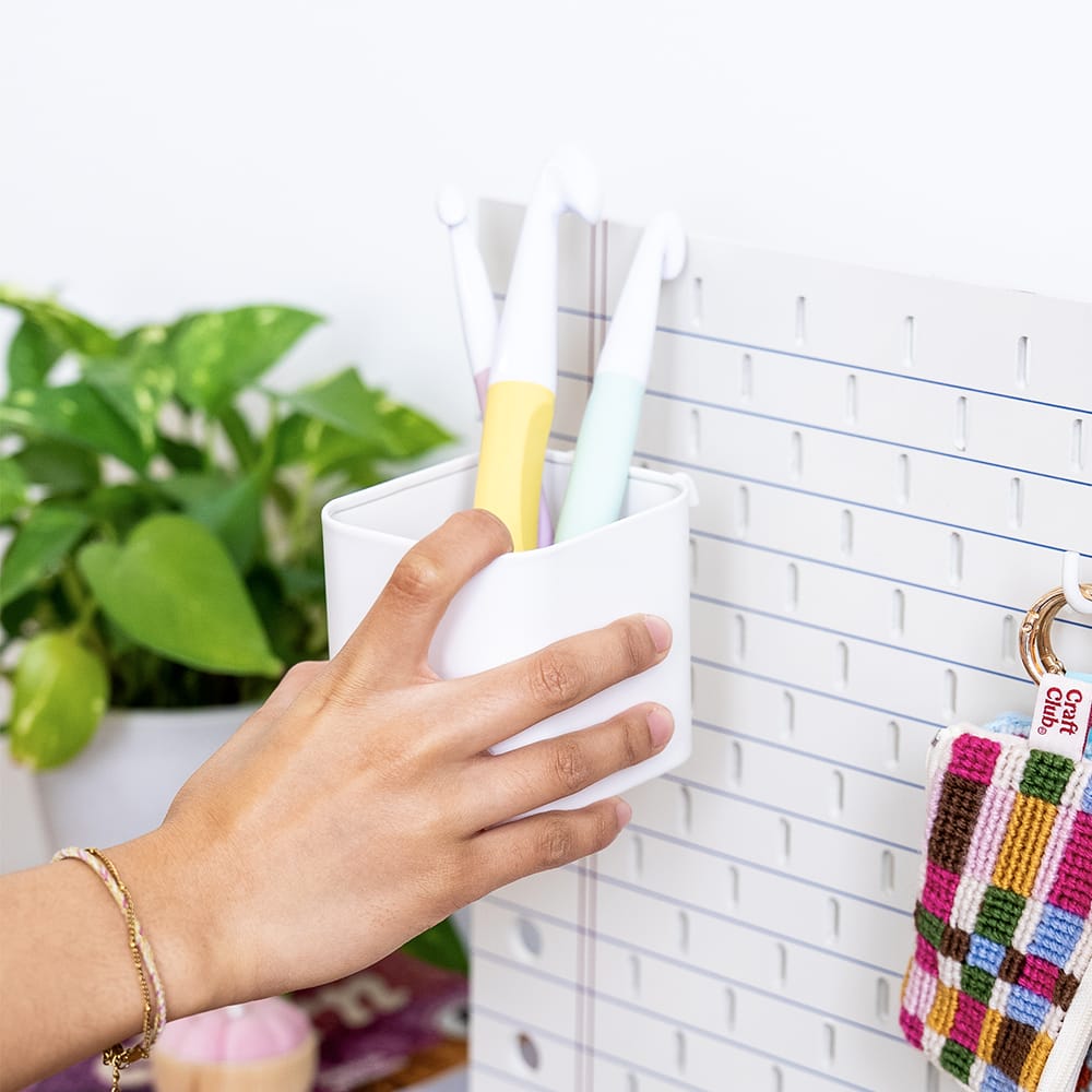 Craft Club TAKING NOTES - Pegboard — adding a cup to the board
