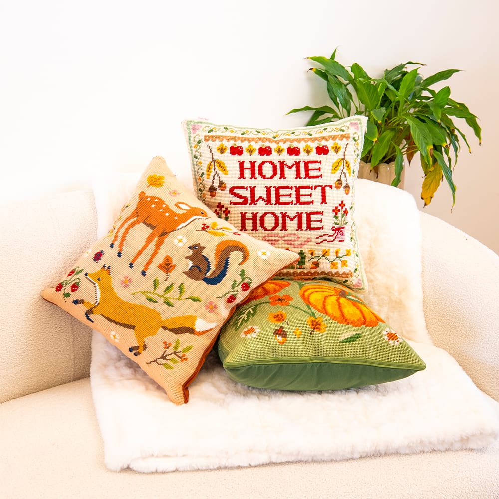 The Full Harvest bundle: the HOME SWEET HOME, FALL FRIENDS and COTTAGE PUMPKINS needlepoint cushions together