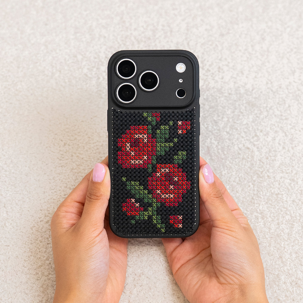 Craft Club Briar Rose Cross Stitch Phone Case Kit — finished case held in hands