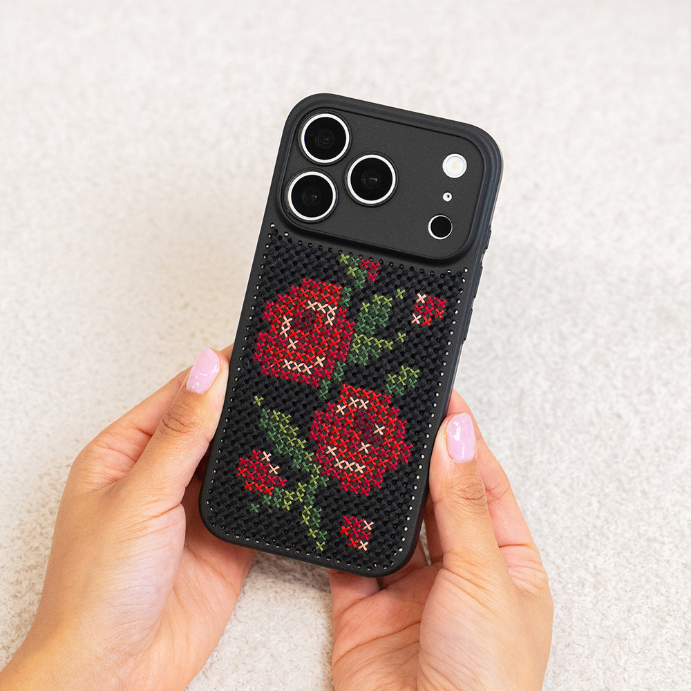 Craft Club Briar Rose Cross Stitch Phone Case Kit — finished case held in hands