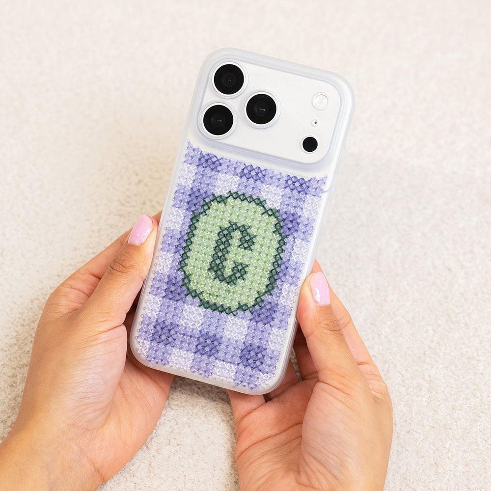 Craft Club Lavender Sage Personalised Initials Cross Stitch Phone Case Kit — finished case held in hands