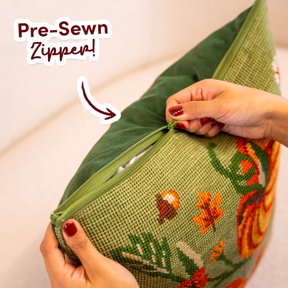 Hands opening the pre-sewn zipper on the finished COTTAGE PUMPKINS cushion cover