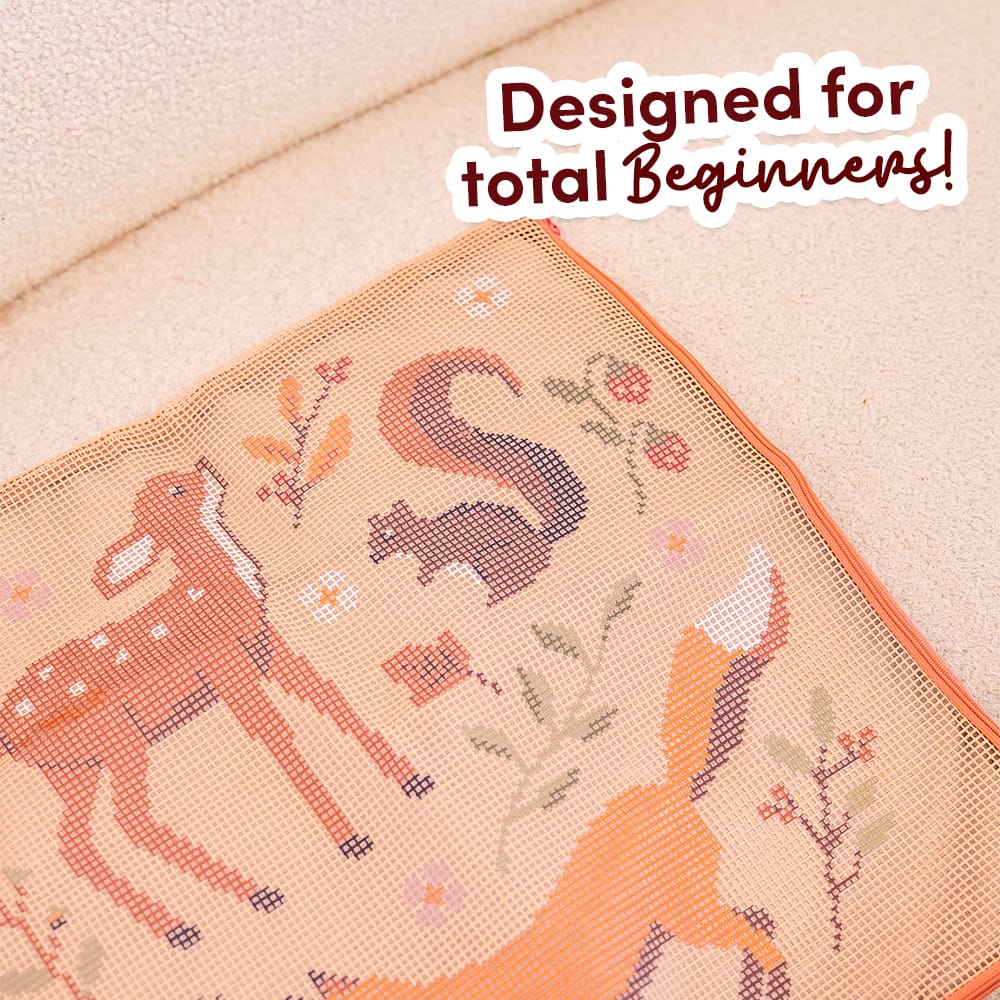 Close-up of the pre-printed FALL FRIENDS canvas showing the deer, squirrel and fox before stitching