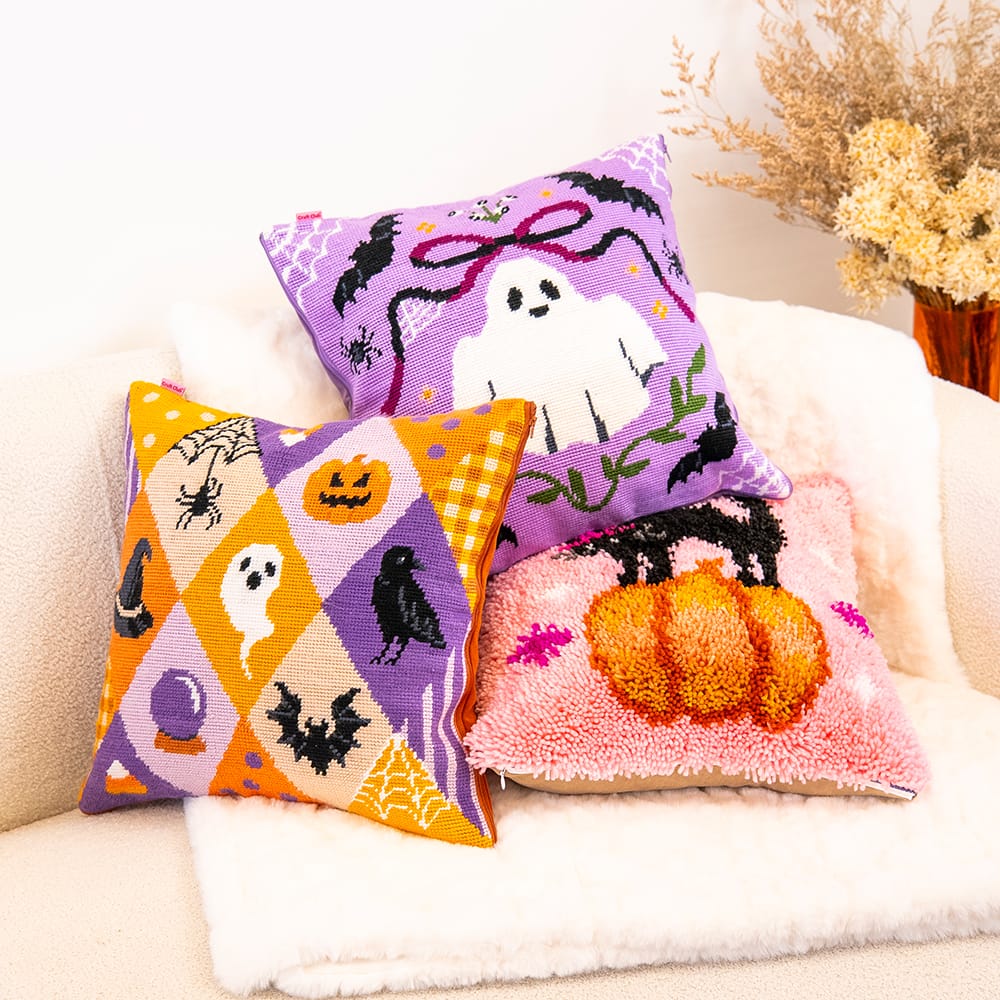 SPOOKY TROVES grouped with the BOO-TIFUL needlepoint cushion and a pink latch hook pumpkin cushion