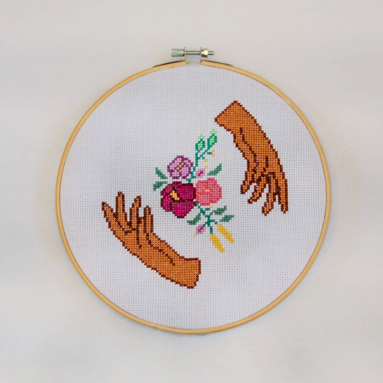 Craft Club Co HANDS HOLD Cross Stitch Kit. Showing the design on a plain white background.