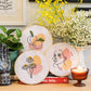 Craft Club Co BLOOM Cross Stitch Kit, Craft Club Co PEACHY Cross Stitch Kit, Craft Club Co LOVER Cross Stitch Kit. The three kits match to form a triptych, their organic shapes are in the same pink and orange colours.