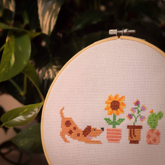 Craft Club Co Pup & the Plants. A close up of the design, showing the detail of the stitching.